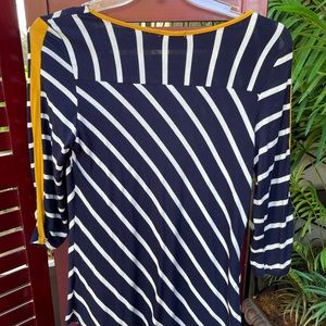 Ava James top perfect for cruise wear. Navy blue and white striped gold details